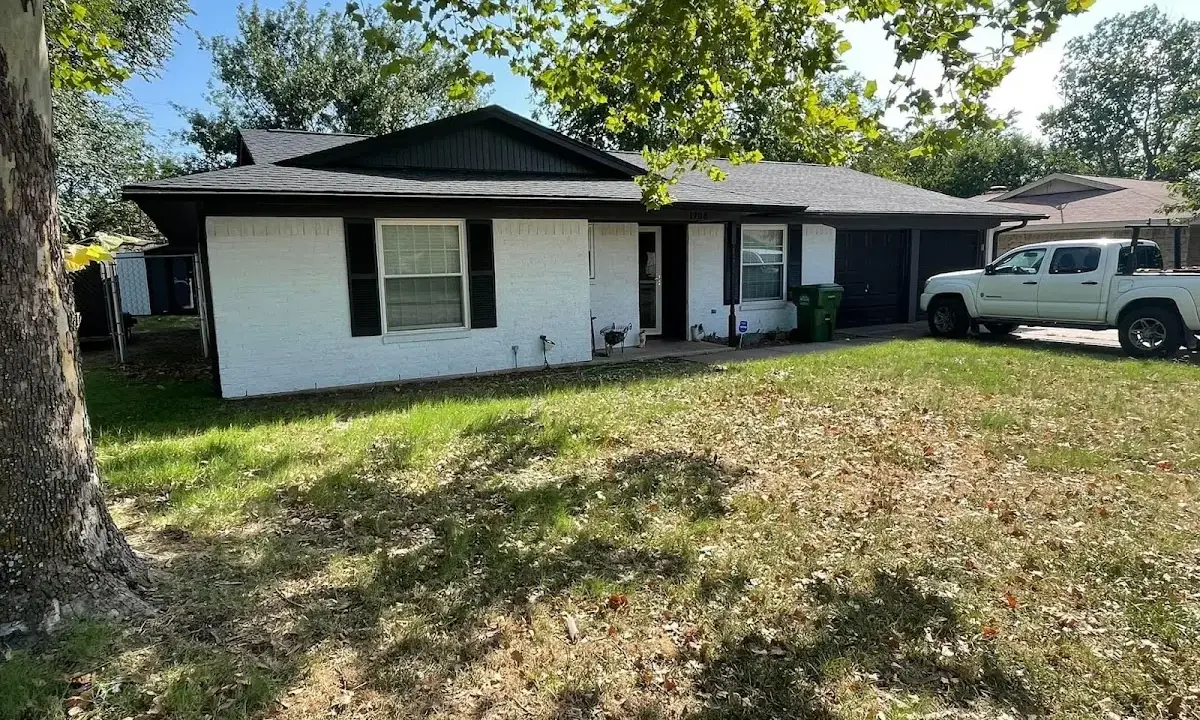 Professional roofing crew working on a residential roof in Washingtonville